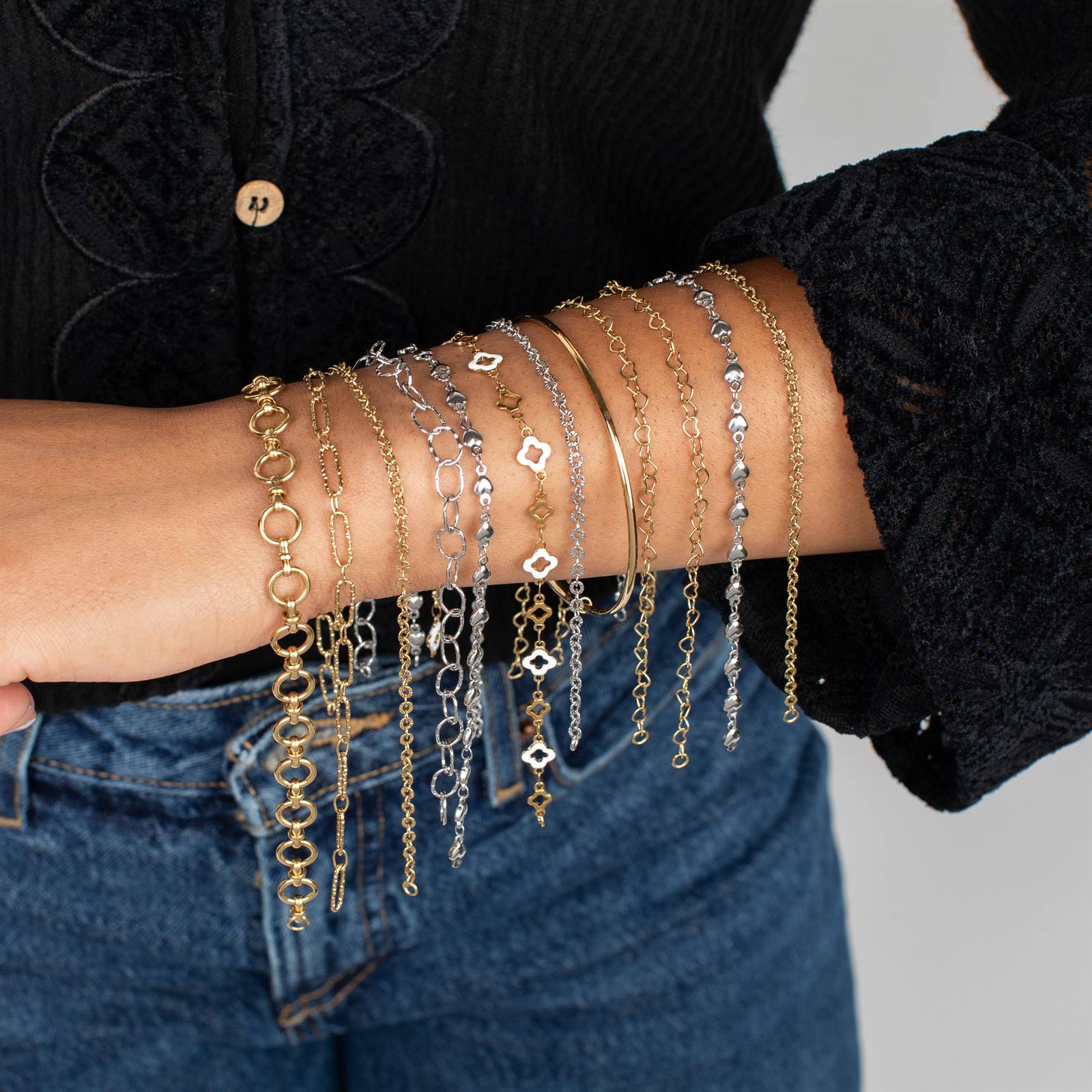 Permanent jewelry chains worn on the wrist